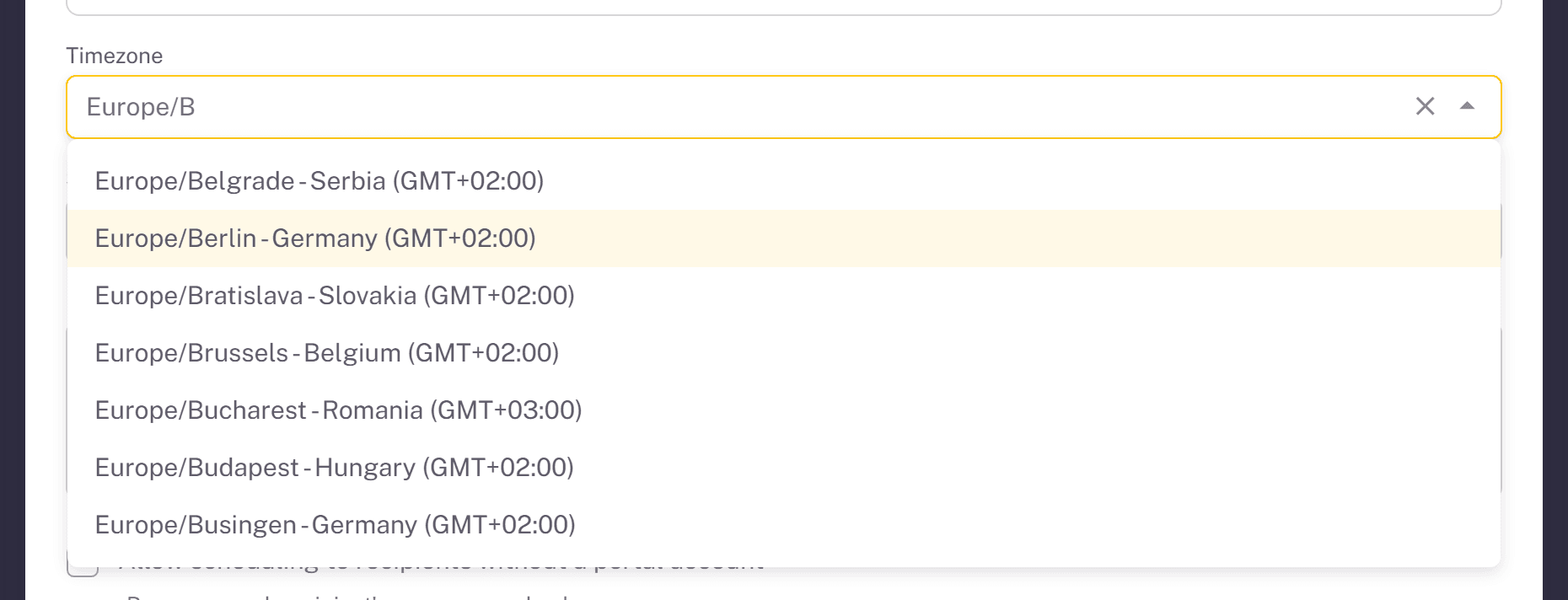 Searchable timezone field showing city, country and UTC offset